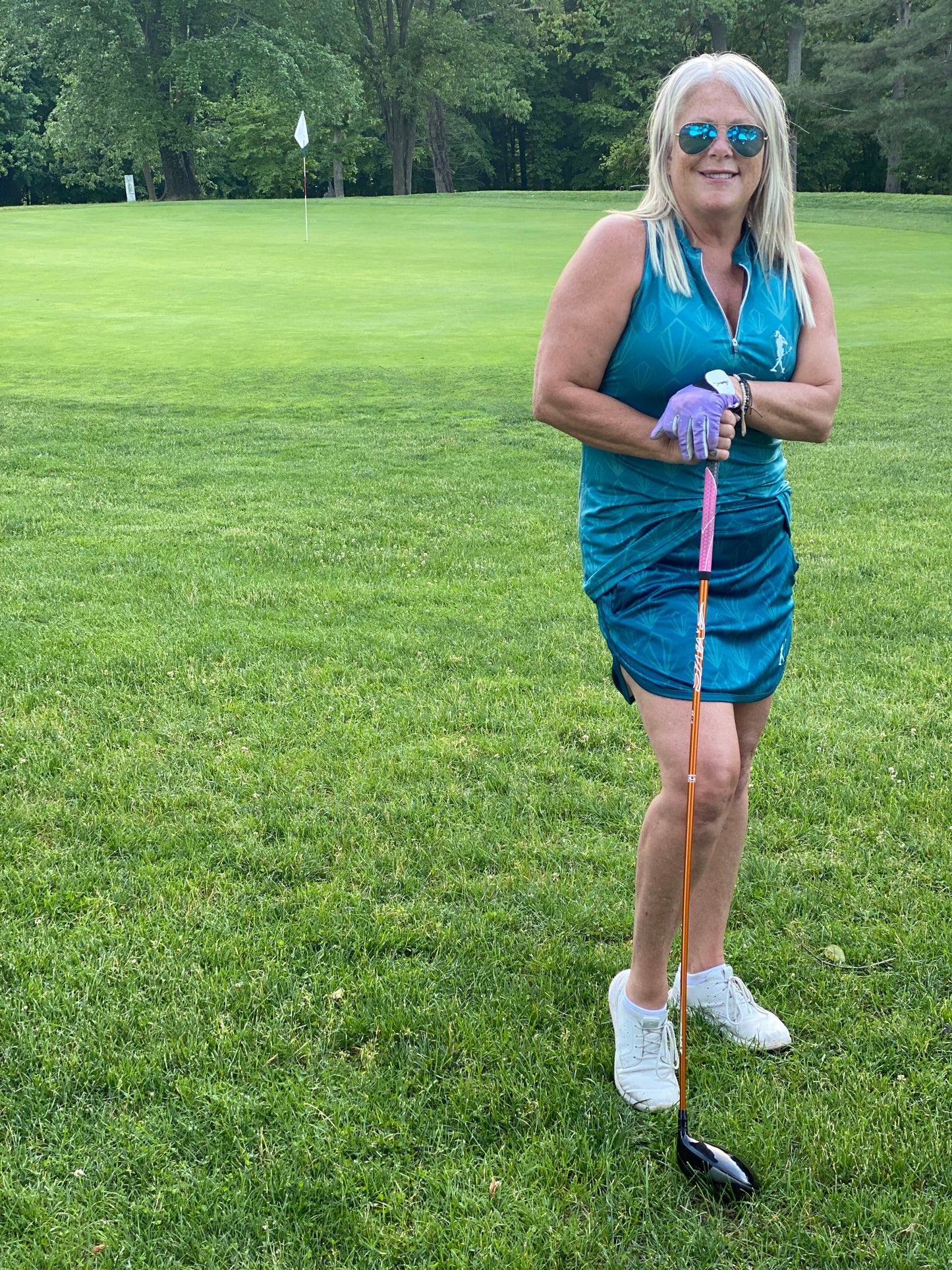 the Greta Women's Golf Sleeveless Zip Polo